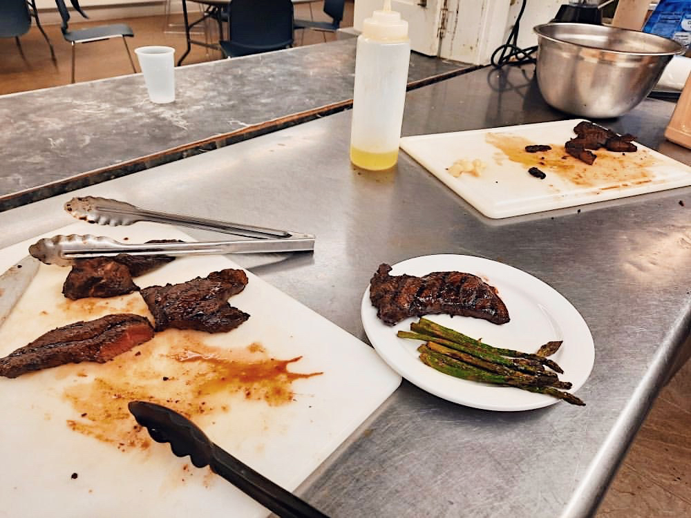 Culinary class steak tips and asparagus